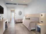 Swim Up Quadruple Junior Suite with pool view