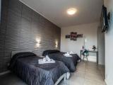 Standard Triple room with garden view