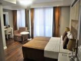 Superior Triple room with balcony and with city view