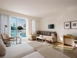 Superior Family room with pool view