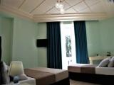 Standard Triple room with balcony and with partial sea view