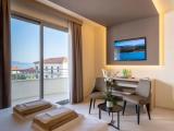 Superior room with balcony and with partial sea view
