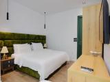 Standard Triple room with partial sea view