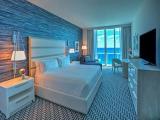 Room with balcony and oceanfront