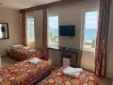 Standard Triple room with sea view