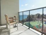 Standard Triple room with balcony and with partial sea view