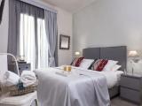 Superior Triple room with balcony and with partial sea view
