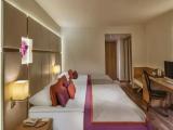 Standard Triple room with side sea view