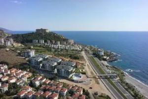 Luxury Apt in Konak Seaside Homes with a Sea Front View and a Private Beach, Kargicak