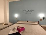 Standard Triple room with balcony and with partial sea view