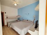 Standard Quadruple room with partial sea view