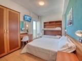 Standard Quadruple room with balcony and oceanfront