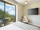 Superior room with balcony and with partial sea view