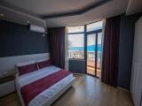 Superior Triple room with balcony and with sea view