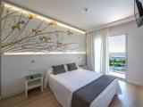 Comfort Quadruple Family Suite with pool view