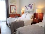 Superior Triple room with balcony and with partial sea view