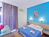 Standard Triple room with garden view