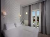 Quadruple room with balcony and with city view
