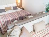 Superior Triple room with balcony and with partial sea view