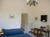Superior Quadruple room with balcony and with garden view