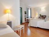 Standard Quadruple room with balcony and with city view