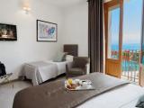 Superior Triple room with balcony and with sea view