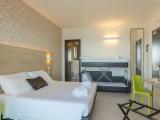 Superior Quadruple room with balcony and with partial sea view