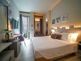 Standard Triple room with partial sea view