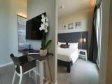 Executive Quadruple room with partial sea view