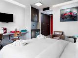 Quadruple (double bed or twin beds and sofa) room