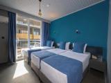 Standard Triple room with balcony and with partial sea view