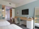 Standard Quadruple room with balcony and with partial ocean view
