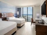 Deluxe Quadruple room with balcony and oceanfront