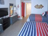 Standard Quadruple room with partial ocean view