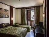 Standard Triple room with garden view