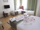 1 Bedroom Deluxe Quadruple room with city view