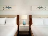 Deluxe Quadruple room with balcony and oceanfront