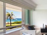 Standard Quadruple room with partial ocean view