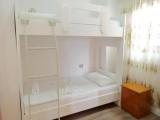 Standard Quadruple room with partial sea view