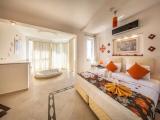 Grand Suite with balcony and with garden view