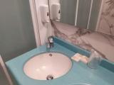 Standard Quadruple room with partial sea view