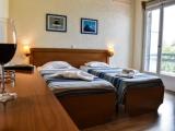 Standard Triple room with partial sea view