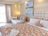 Superior Triple room with balcony and beachfront