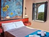 Standard Triple room with partial sea view