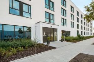 Super 8 by Wyndham Munich City North Mini-hotel, Munchen