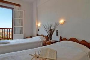 Alex Hotel, Tourlos