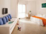 Standard Triple room with balcony and with partial sea view