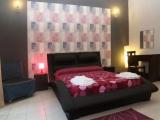 Deluxe Quadruple room with balcony