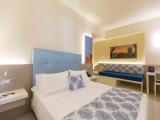 Standard Triple room with garden view