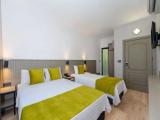 Standard Triple room with balcony and beachfront